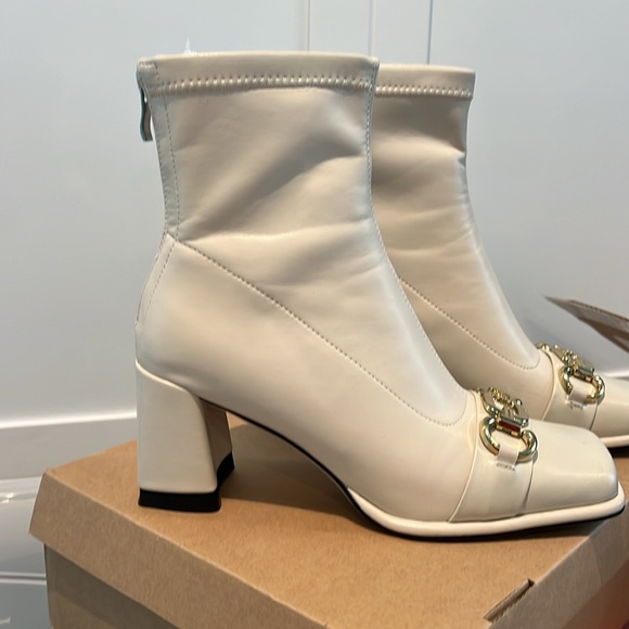 Larosa cream colored short boot with gold buckle accent - Picture 2 of 6